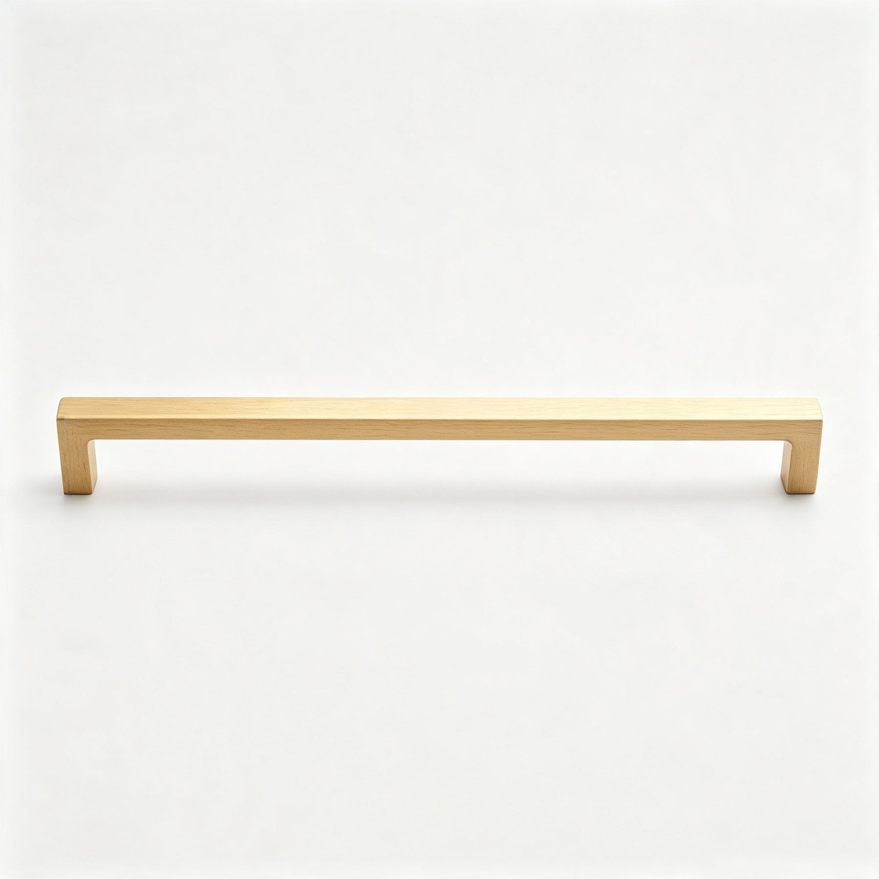 Warm metallic rectangular bar cabinet pull on a white background