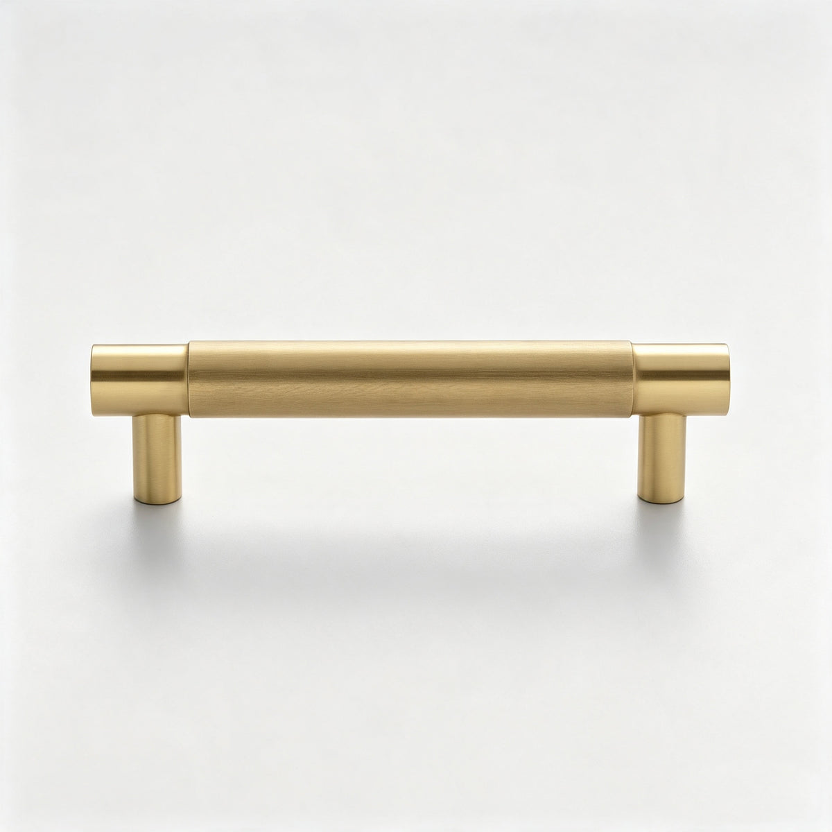 Warm metallic T-bar cabinet pull on a white background